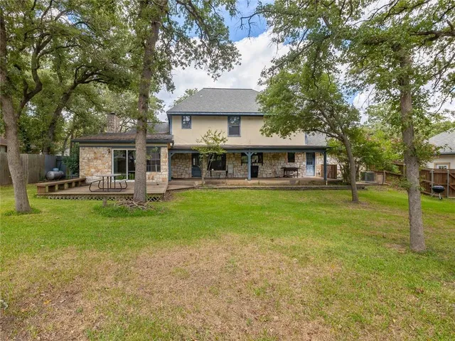 front view of a house with a big yard