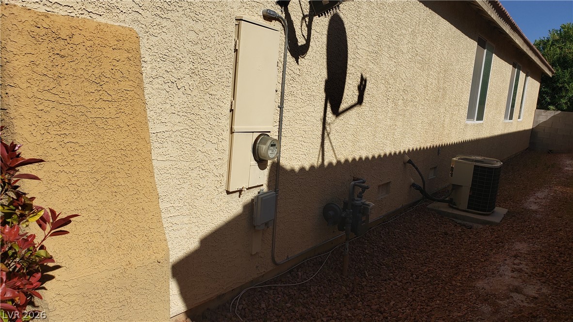 9112 Manalang Road Las Vegas, NV 89123 - Photo 6 of 50 A stucco exterior with neat landscaping creates an appealing outdoor space.
