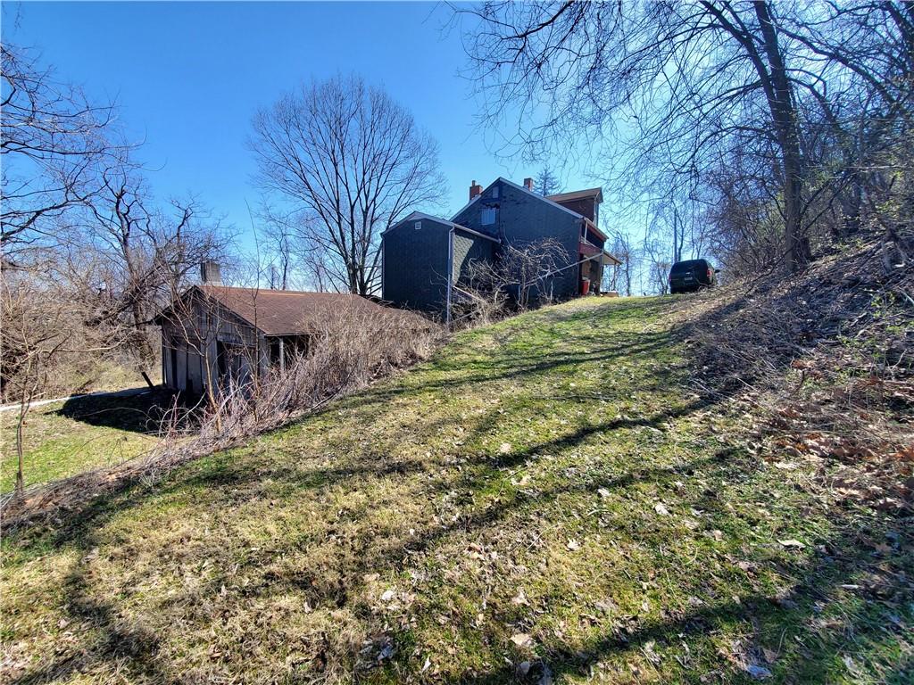 400 Logan Street Pittsburgh, PA 15209 - Photo 1 of 1 a view of a house with a yard