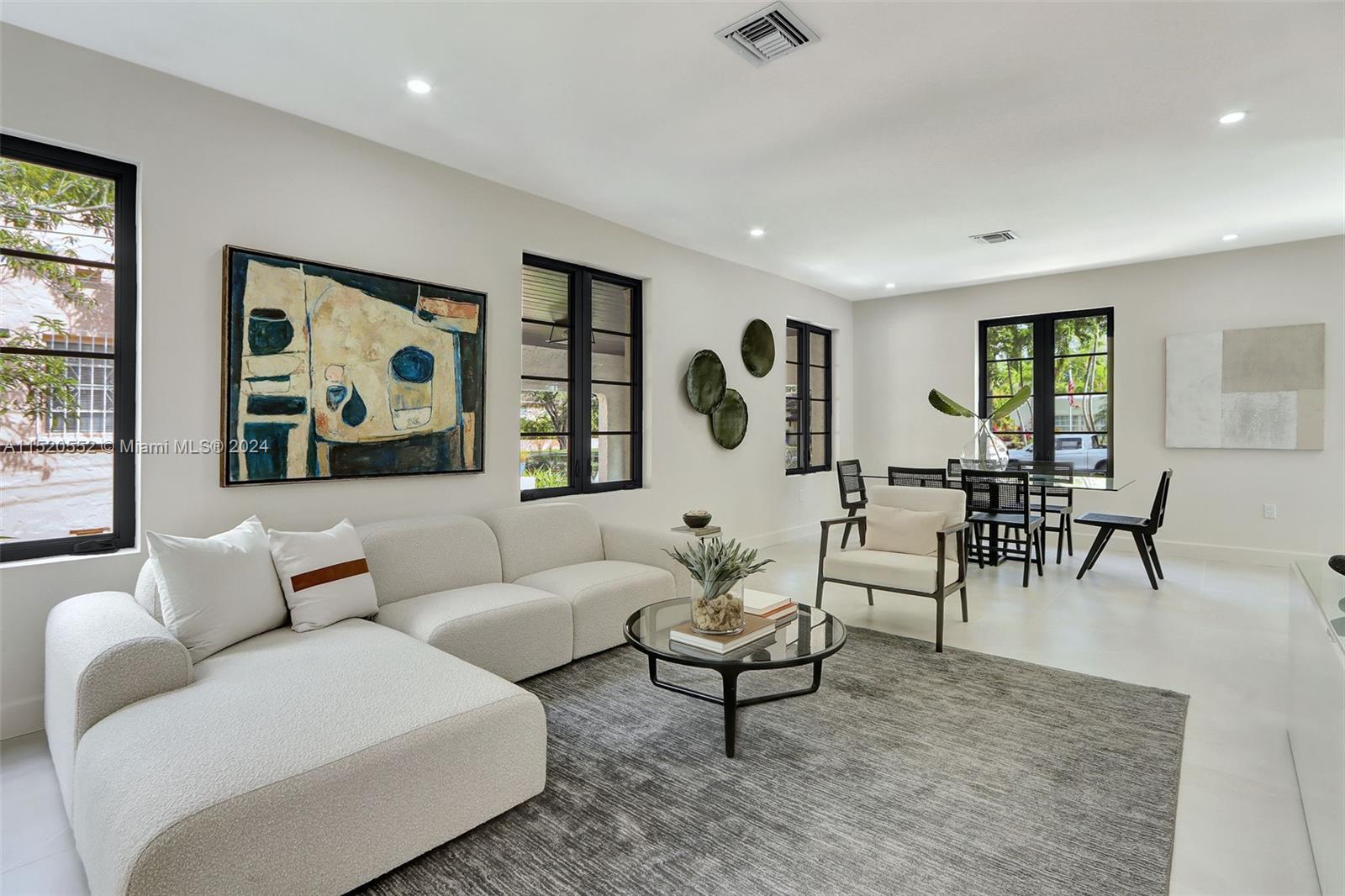 Granada Coral Gables, FL 33134 - Photo 15 of 36 a living room with furniture and a large window