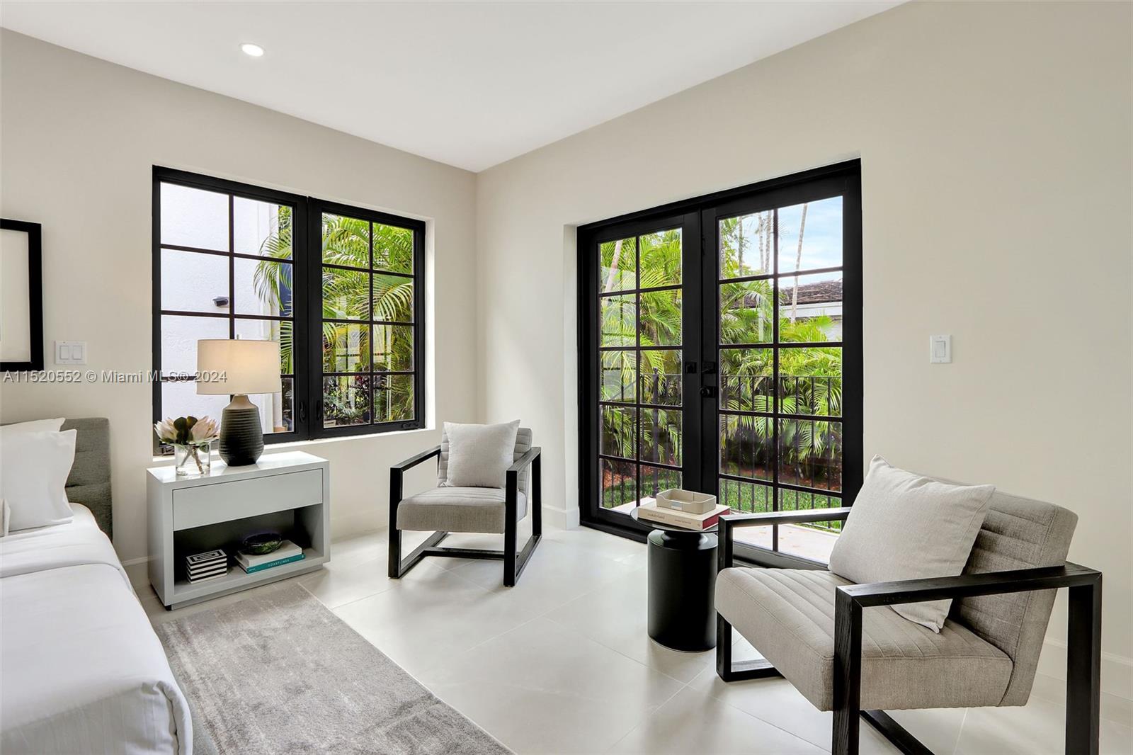 Granada Coral Gables, FL 33134 - Photo 23 of 36 a living room with furniture and a large window