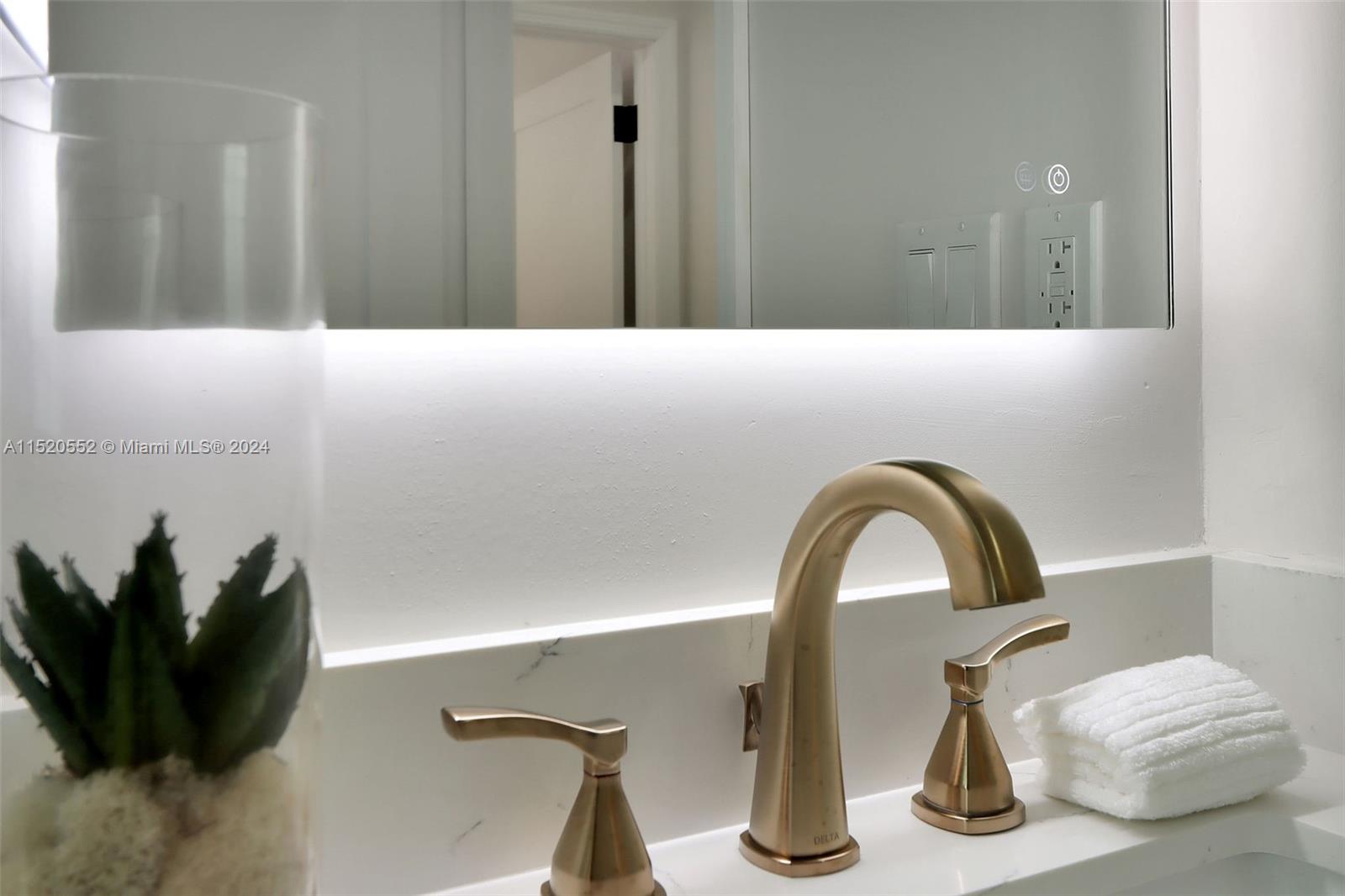 Granada Coral Gables, FL 33134 - Photo 30 of 36 a bathroom with a sink