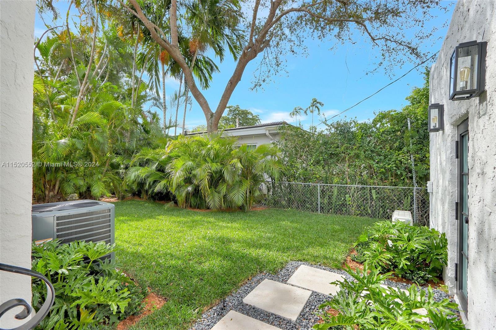 Granada Coral Gables, FL 33134 - Photo 5 of 36 a backyard of a house with lots of green space