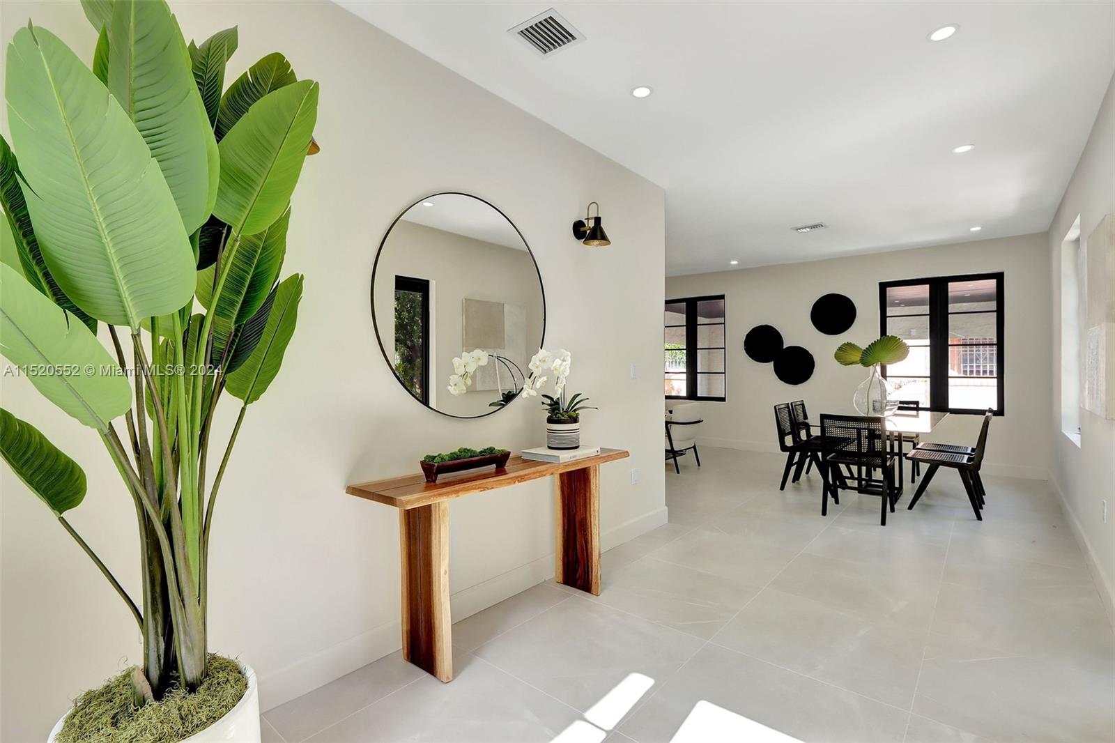 Granada Coral Gables, FL 33134 - Photo 10 of 36 a living room filled with furniture