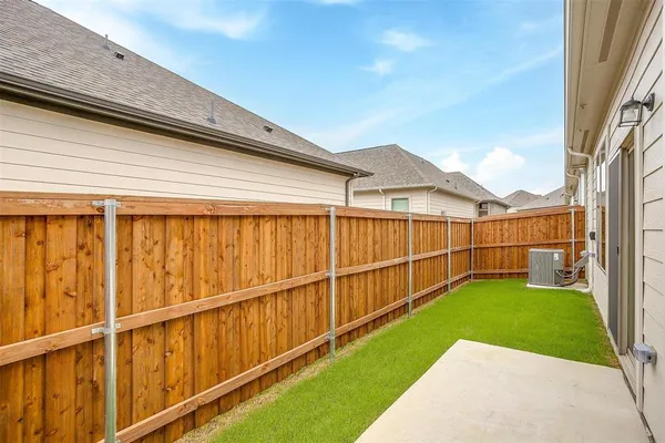 a view of a backyard with a garden