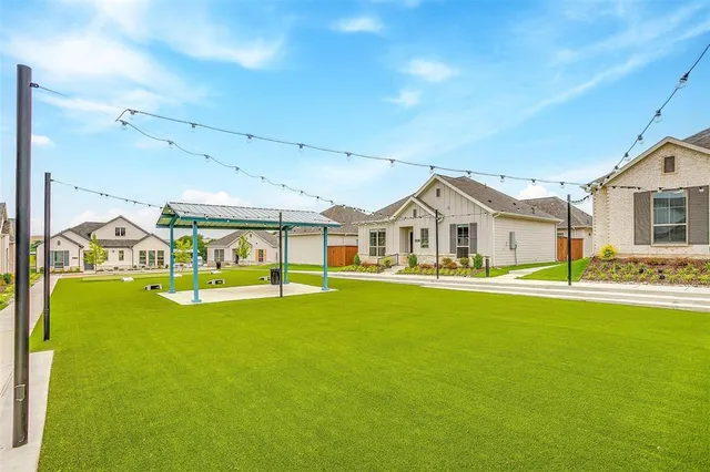 a aerial view of a house with swimming pool