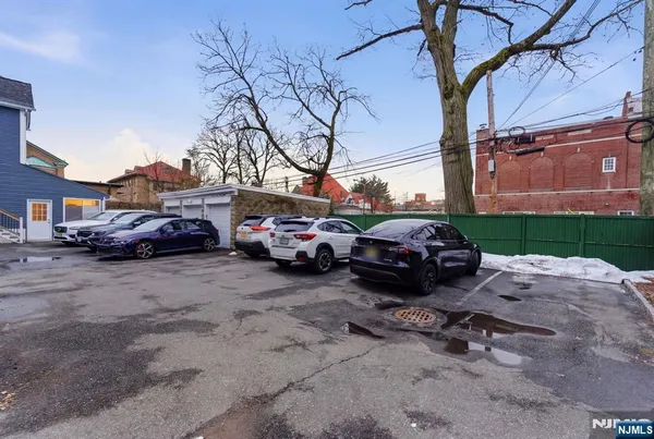 a car parked in front of a house