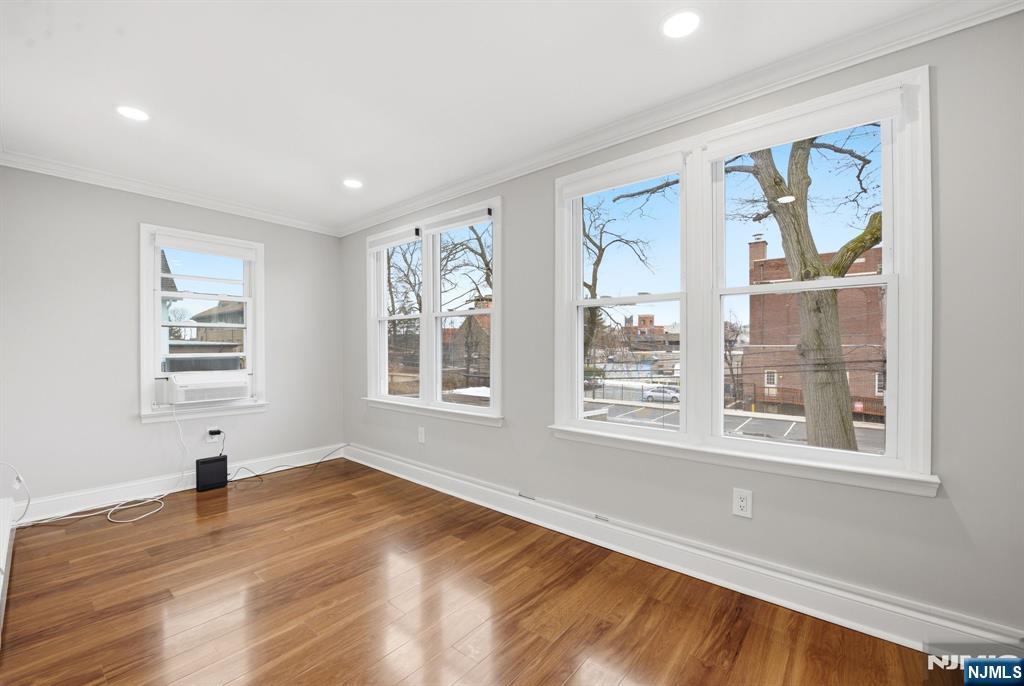 16 Munn Street, Unit 2 Montclair, NJ 07042 - Photo 8 of 21 a view of empty room with wooden floor and fan