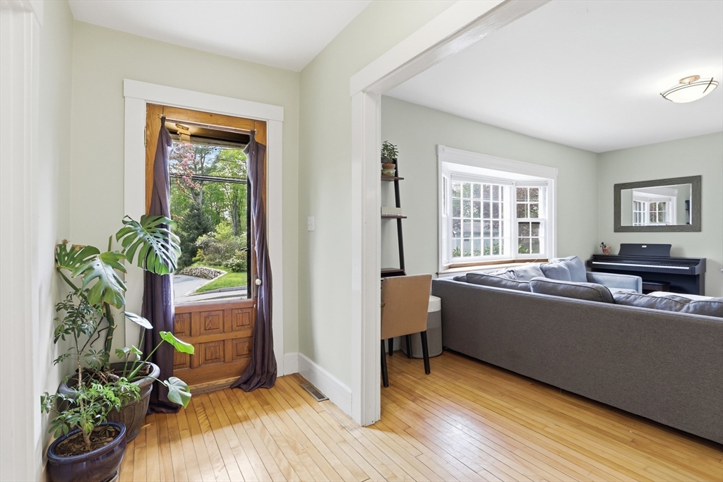 80 Concord Street Maynard, MA 01754 - Photo 12 of 29 a living room with furniture and a potted plant
