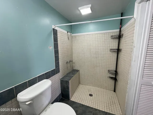 a view of swimming pool with outdoor seating