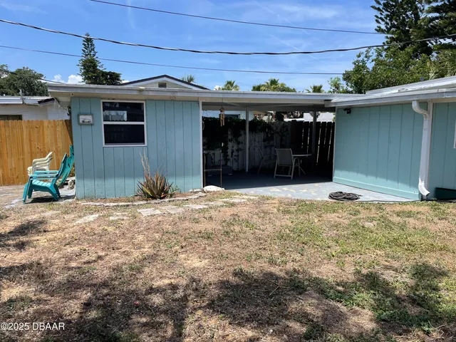 a view of backyard with green space