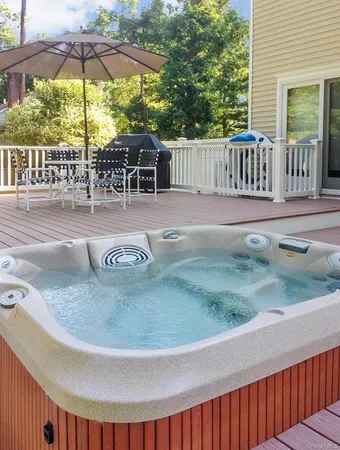 a view of a swimming pool with a patio