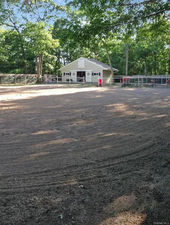 a view of outdoor space with tub and seating