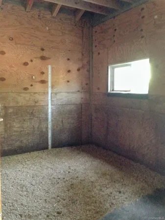 a view of backyard with trampoline