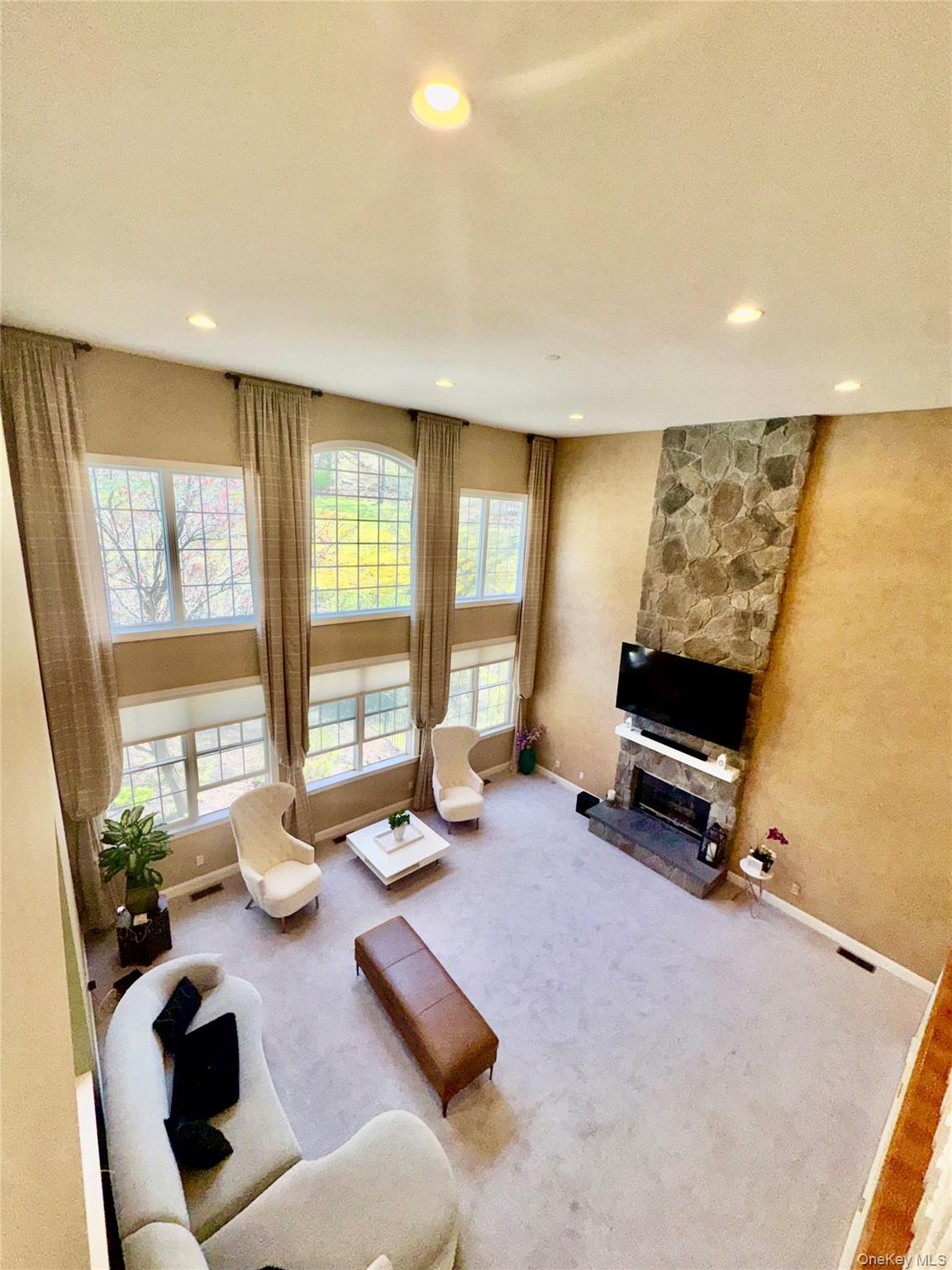 194 Devon Farms Road Stormville, NY 12582 - Photo 27 of 37 a room with furniture gym equipment and a large window