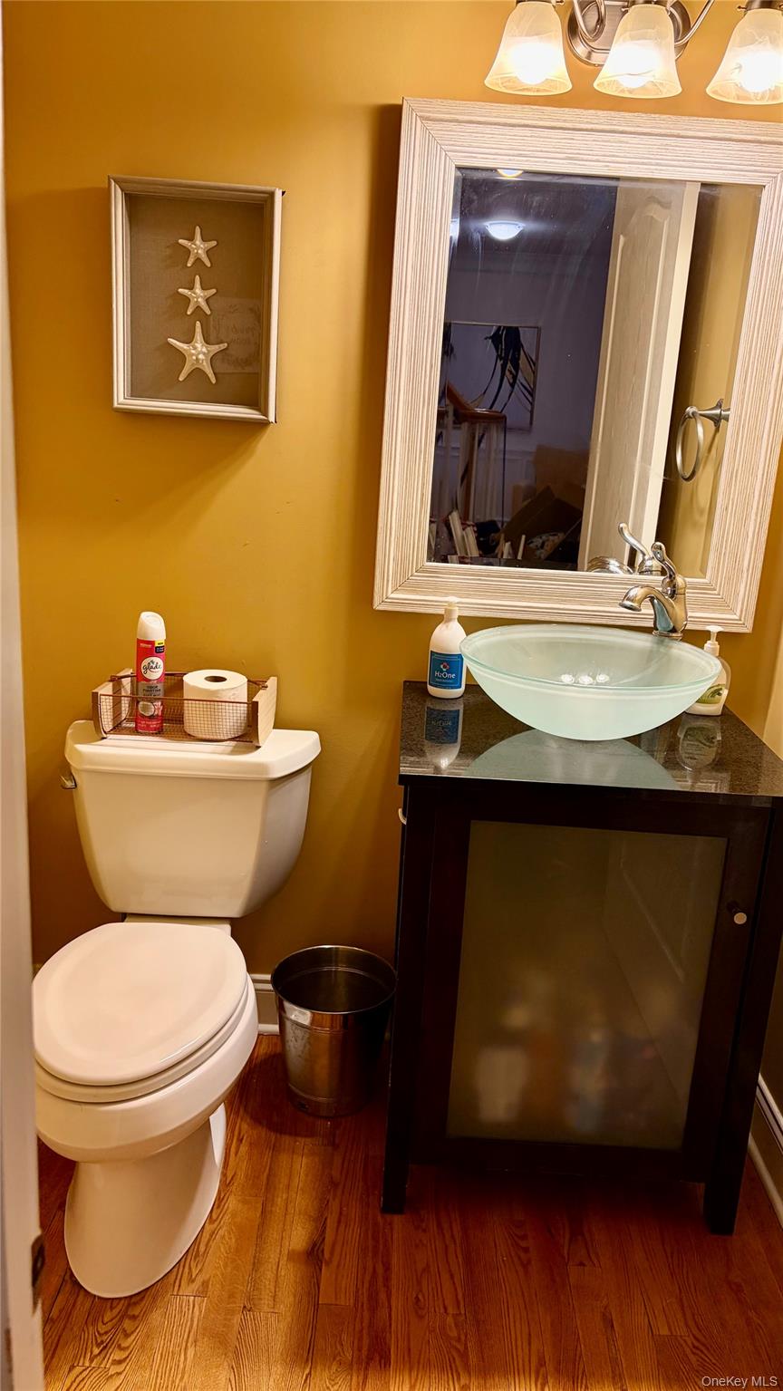 194 Devon Farms Road Stormville, NY 12582 - Photo 28 of 37 a bathroom with a toilet a sink and mirror