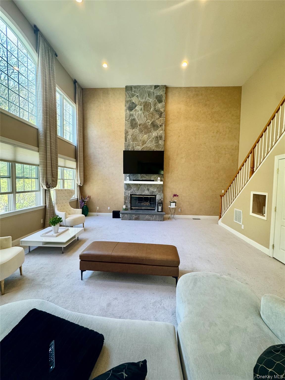 194 Devon Farms Road Stormville, NY 12582 - Photo 29 of 37 a living room with furniture and a flat screen tv