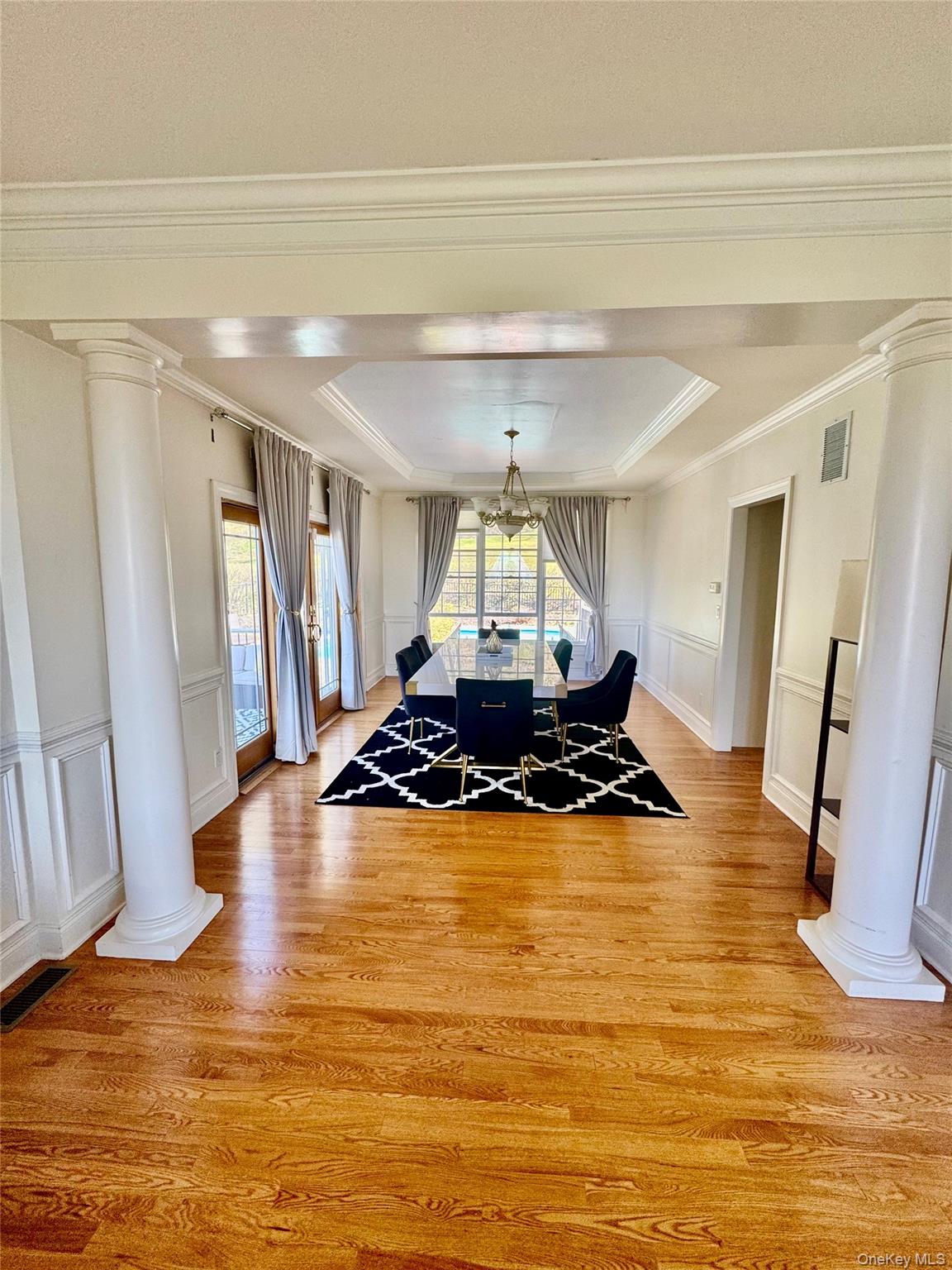 194 Devon Farms Road Stormville, NY 12582 - Photo 9 of 37 a view of a living room with furniture and wooden floor