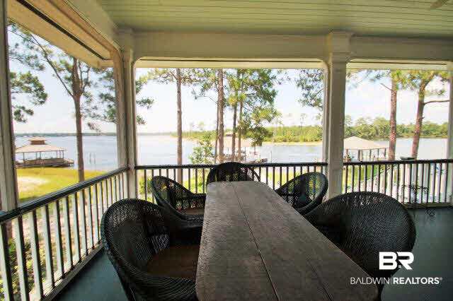 28535 Harbor Court Elberta, AL 36530 - Photo 19 of 21 Screened Porch offers spectacular views and plenty of room for entertaining.