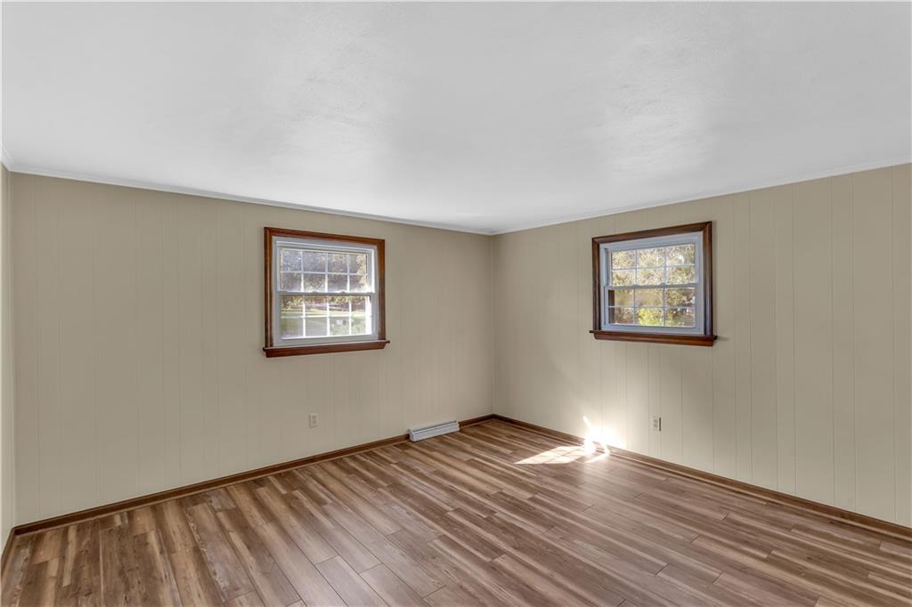 97 Emery Road Fredericktown, PA 15333 - Photo 13 of 23 a view of a room with wooden floor and window