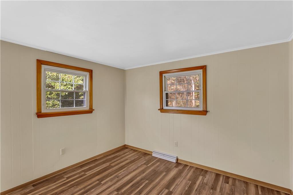 97 Emery Road Fredericktown, PA 15333 - Photo 15 of 23 a view of an empty room with window and wooden floor