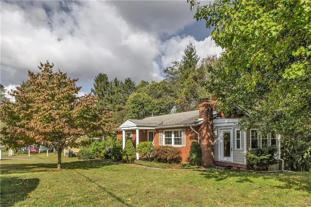 front view of house with a yard