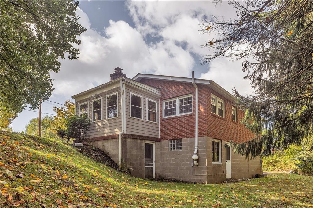 97 Emery Road Fredericktown, PA 15333 - Photo 22 of 23 a view of a house with a yard