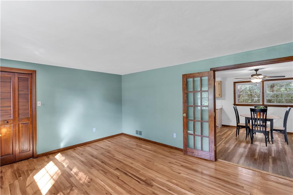 97 Emery Road Fredericktown, PA 15333 - Photo 5 of 23 a view of a livingroom with furniture window and wooden floor