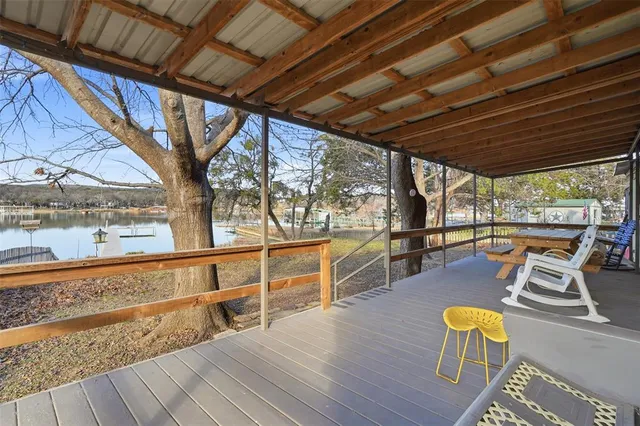 a view of a chairs and table on the wooden floor