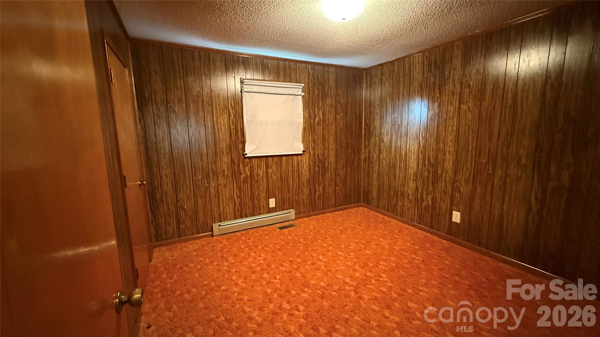 4072 Beach Road Hudson, NC 28638 - Photo 17 of 25 a view of an empty room with wooden floor