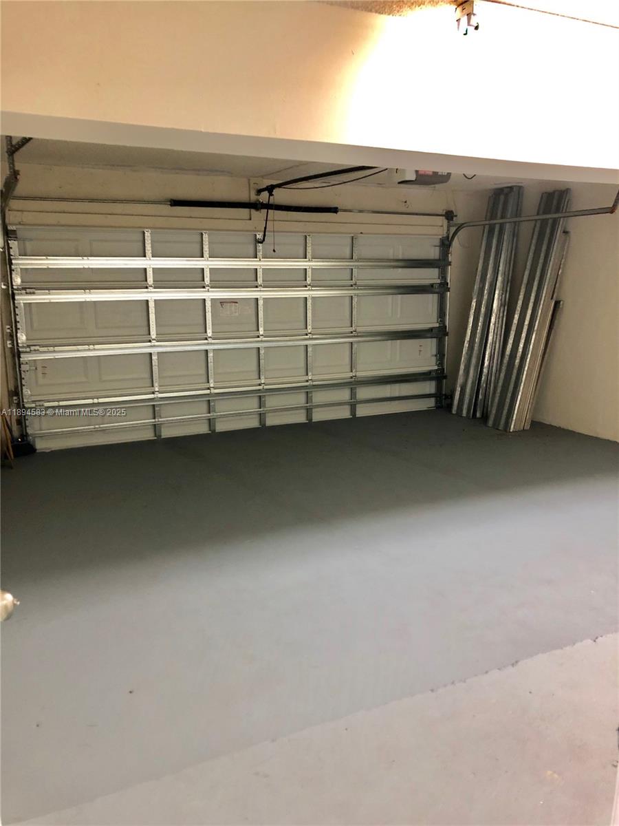 1010 Southwest 99th Avenue Pembroke Pines, FL 33025 - Photo 22 of 22 a view of a closet with storage