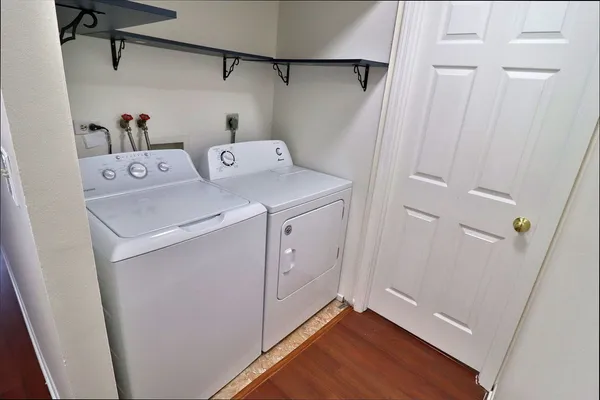 a utility room with dryer and washer