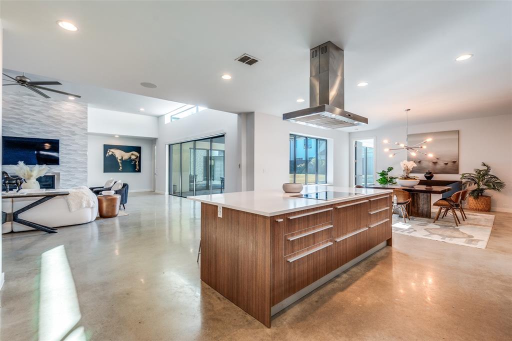 9317 Midway Road Dallas, TX 75220 - Photo 10 of 30 a view of living room with furniture and chandelier