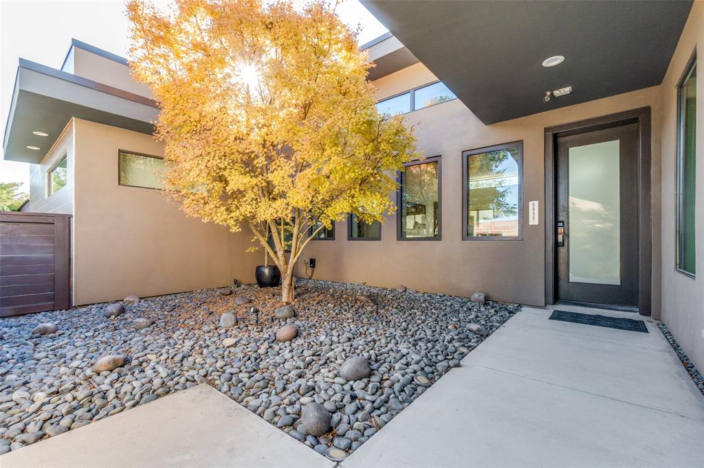9317 Midway Road Dallas, TX 75220 - Photo 4 of 30 a house view with a garden space