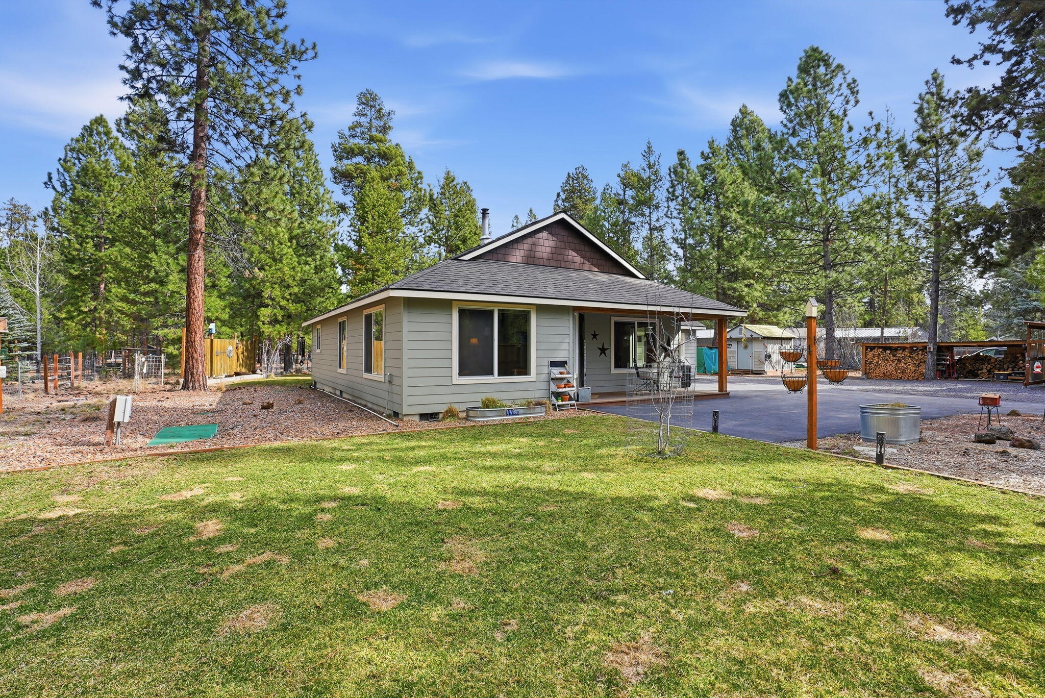 51432 Jory Road La Pine, OR 97739 - Photo 3 of 51 a backyard of a house with table and chairs