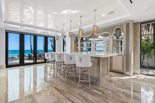 a bedroom with a large bed and a large window