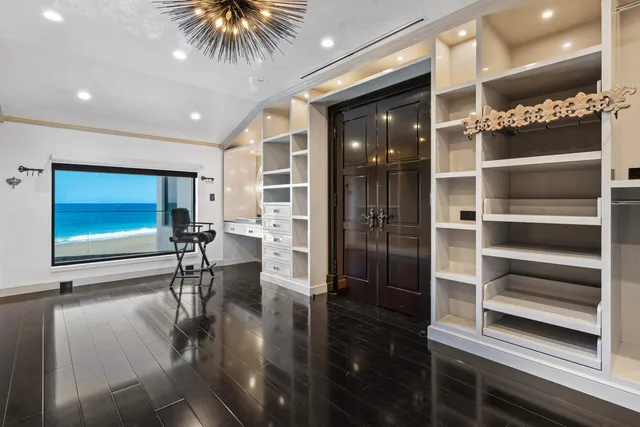 a front view of a house with a yard table and chairs