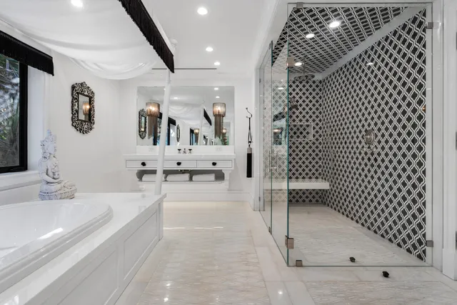 a bathroom with a toilet a sink and a mirror