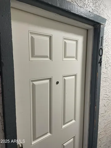 a view of a house with a street