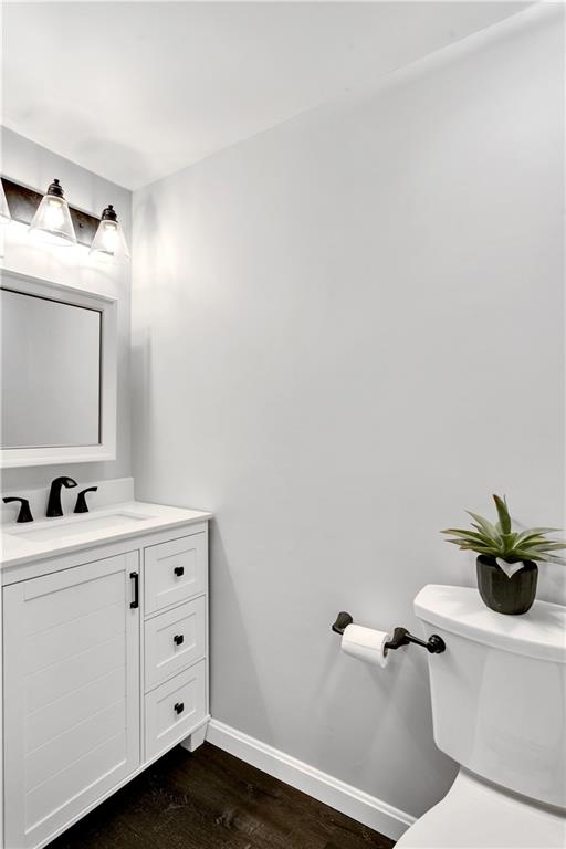 237 Acre Avenue Butler, PA 16001 - Photo 21 of 34 a bathroom with a sink a toilet and a mirror