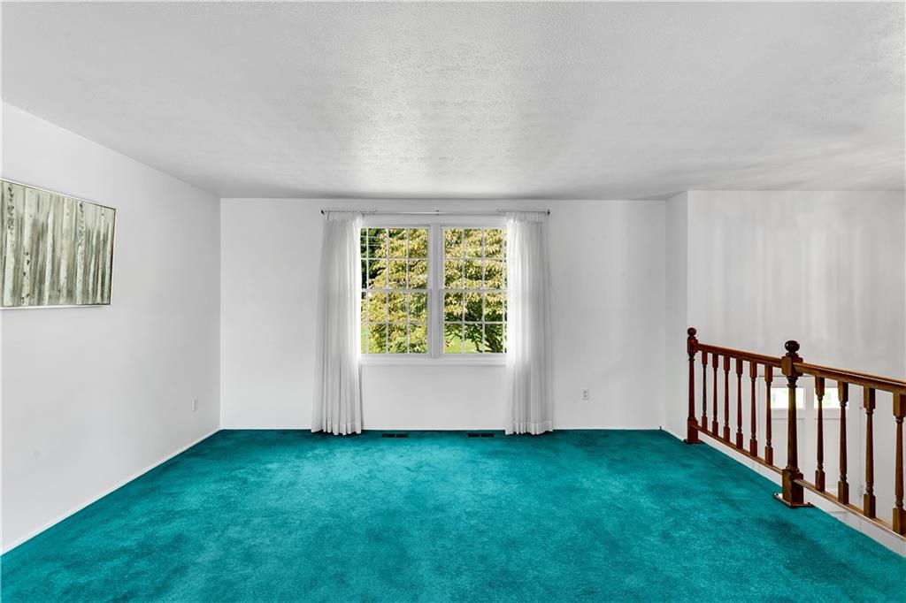 237 Acre Avenue Butler, PA 16001 - Photo 6 of 34 a view of an empty room with a window