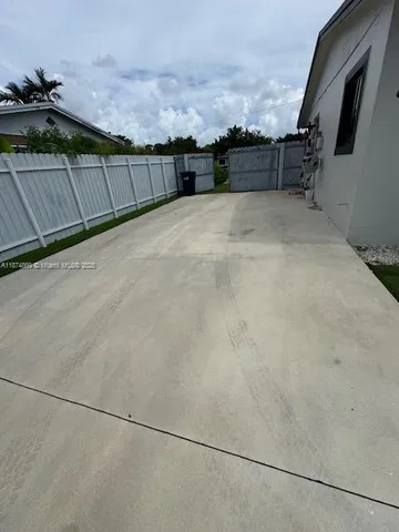 a view of terrace and car parked