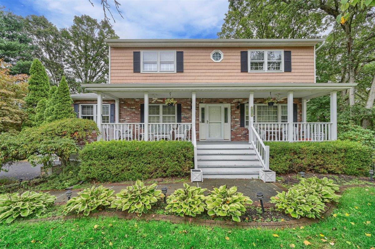 129 Barnes Road Washingtonville, NY 10992 - Photo 1 of 48 front view of a house with a yard