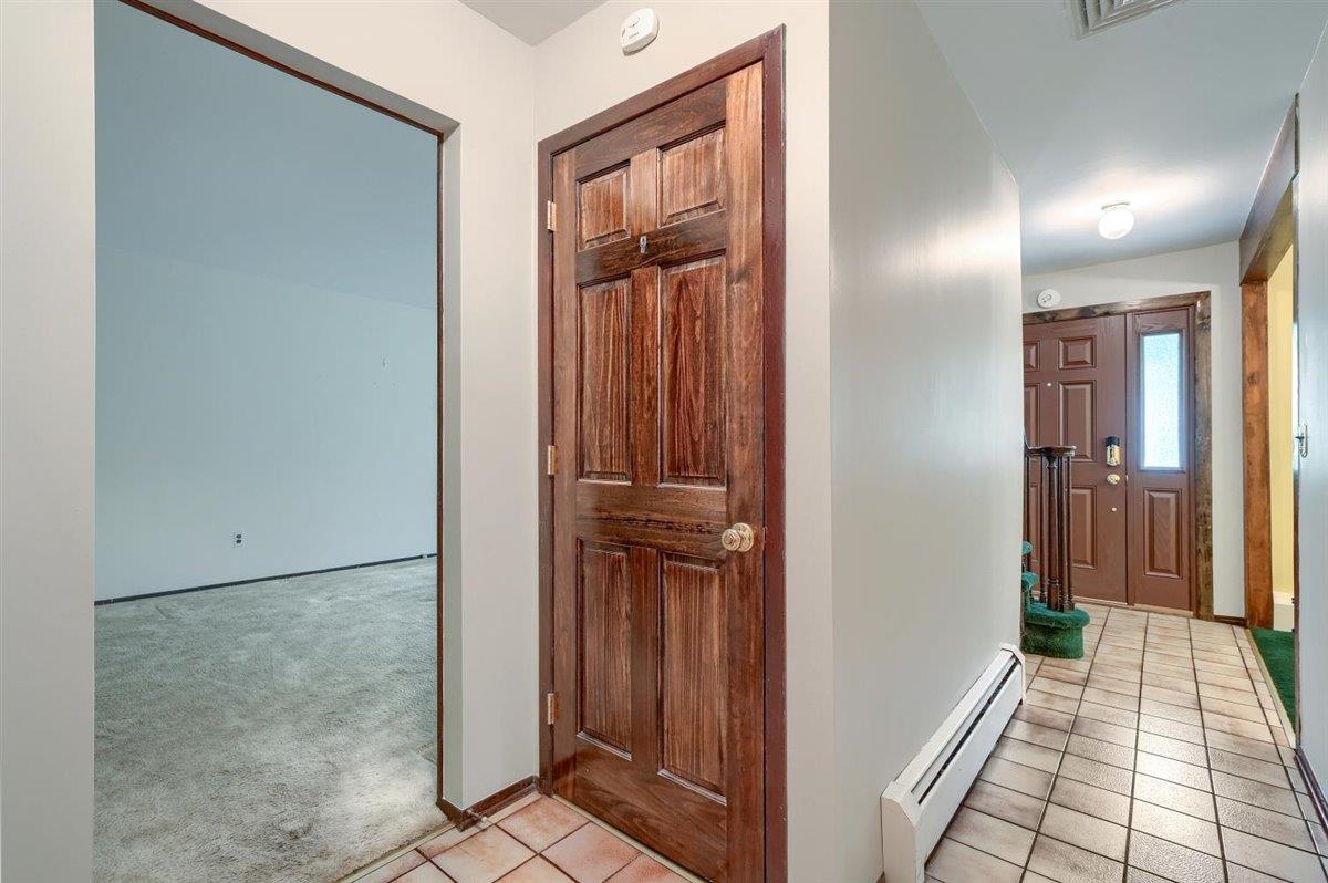 129 Barnes Road Washingtonville, NY 10992 - Photo 11 of 48 a view of a hallway with wooden floor