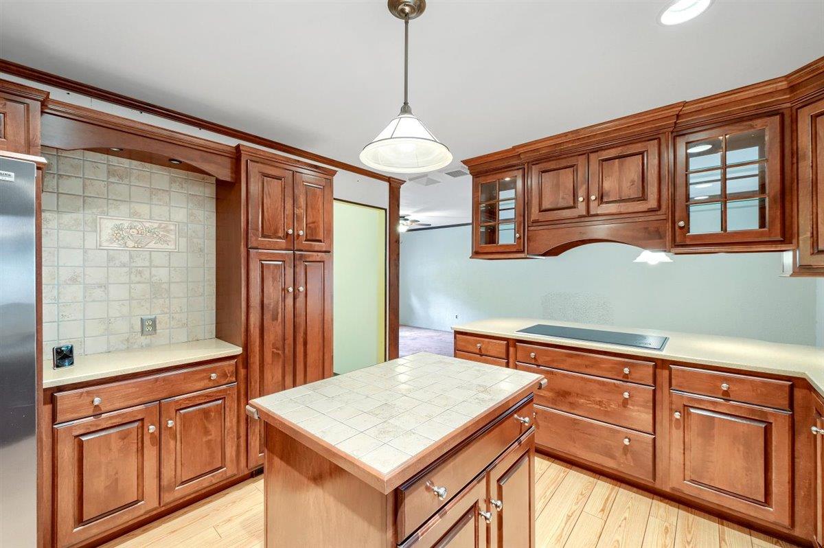 129 Barnes Road Washingtonville, NY 10992 - Photo 13 of 48 a kitchen with stainless steel appliances granite countertop wooden cabinets a refrigerator and a sink
