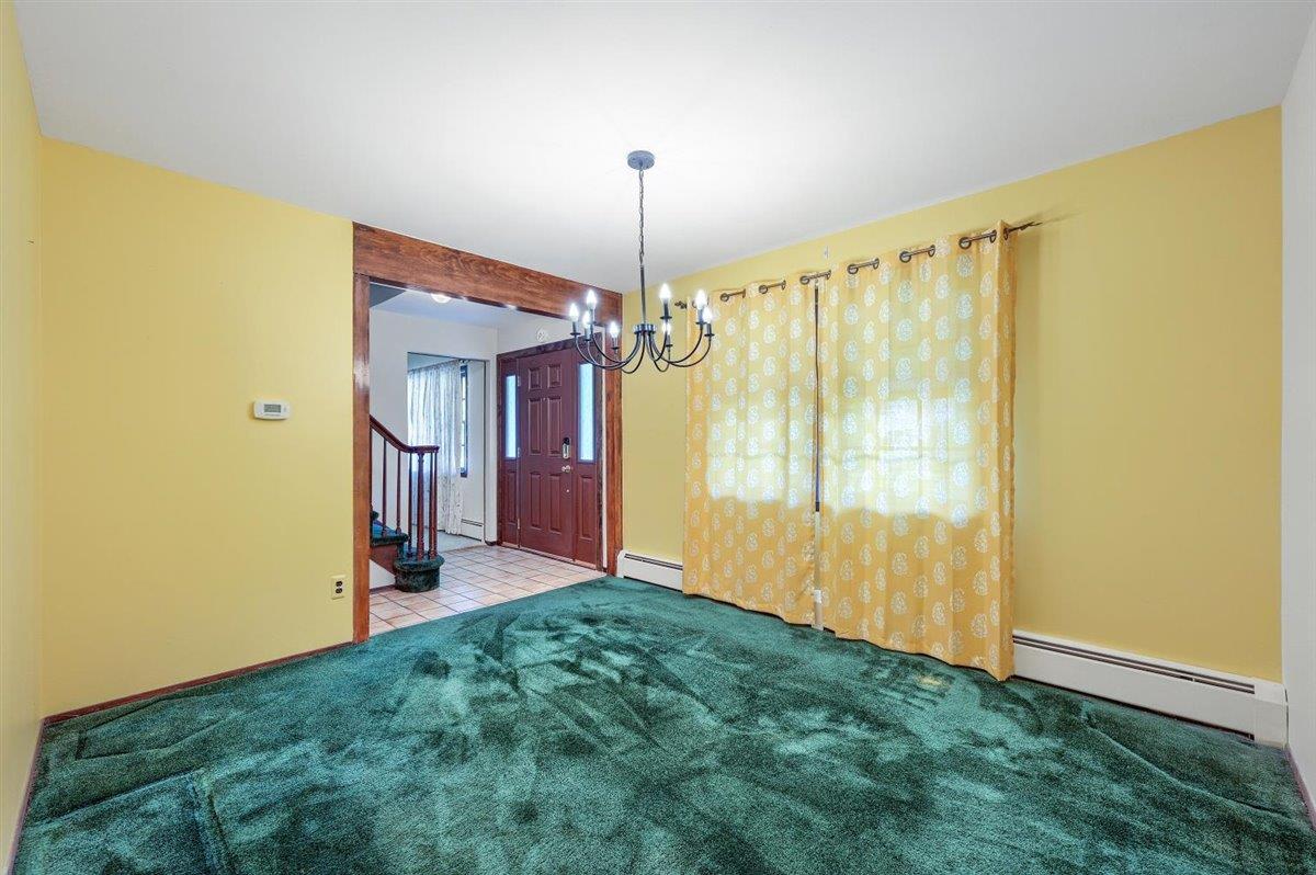 129 Barnes Road Washingtonville, NY 10992 - Photo 18 of 48 a view of a room with window and stairs