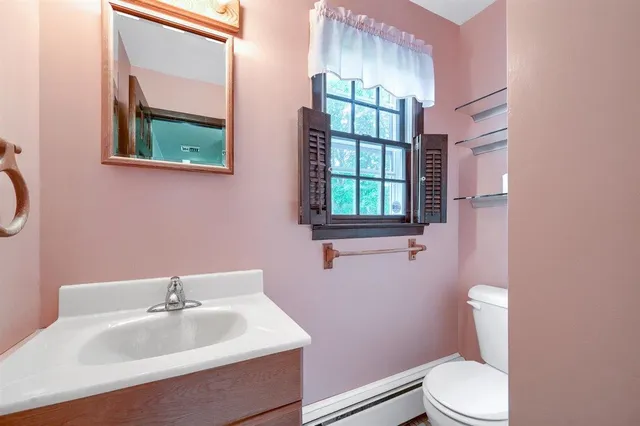 a view of a room with window and stairs