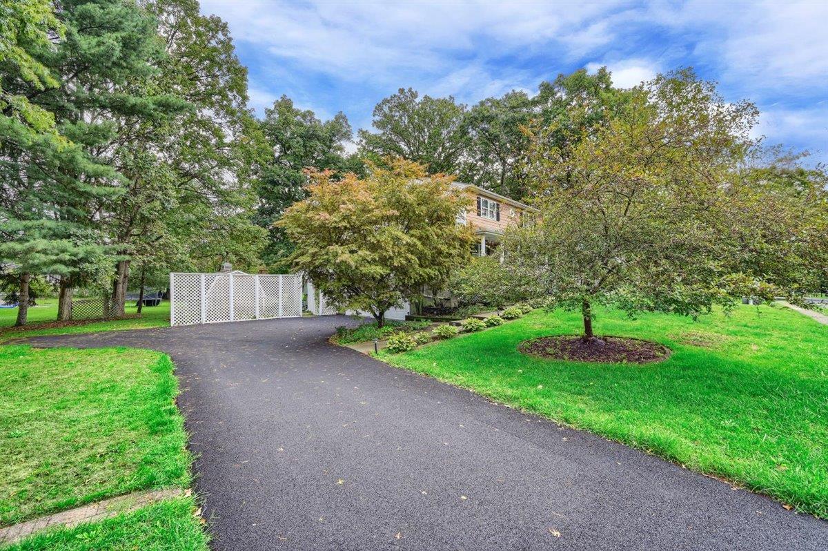 129 Barnes Road Washingtonville, NY 10992 - Photo 2 of 48 a view of a street with a house in the background