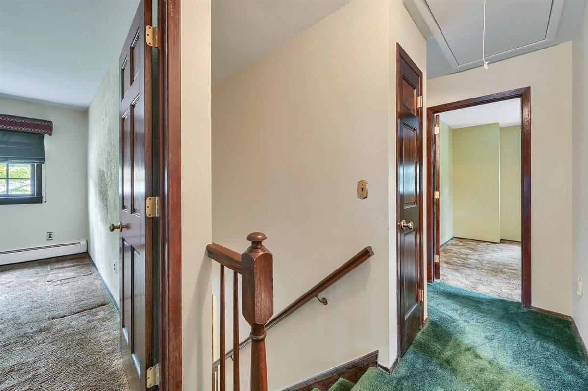129 Barnes Road Washingtonville, NY 10992 - Photo 24 of 48 a view of a hallway with a livingroom and interior of the house