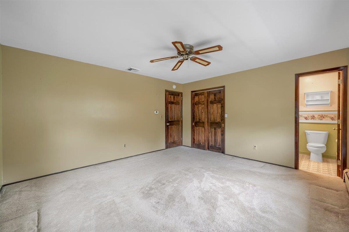 129 Barnes Road Washingtonville, NY 10992 - Photo 31 of 48 a view of room with a ceiling fan and window